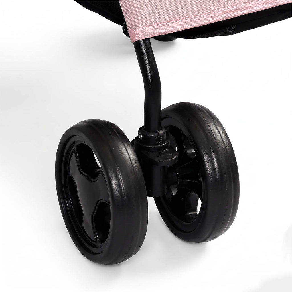 Close-up of double wheels on pink four-wheel pet stroller