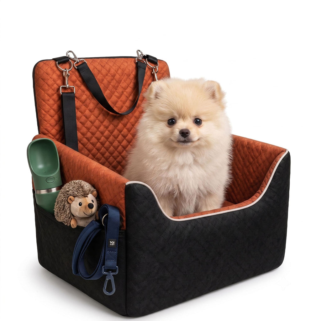 Small dog sitting in a quilted pet car seat with side pocket and travel accessories