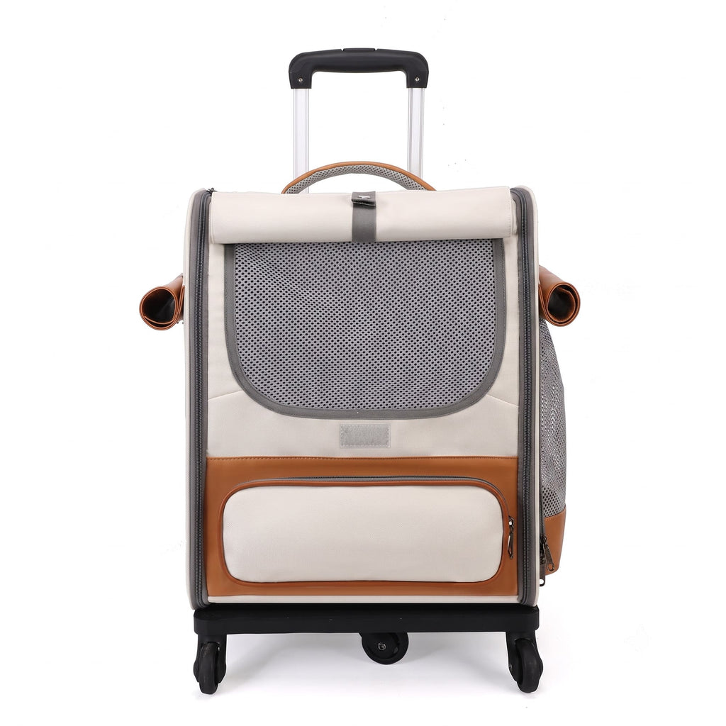 White pet luggage carrier with mesh front window, trolley handle, and wheels