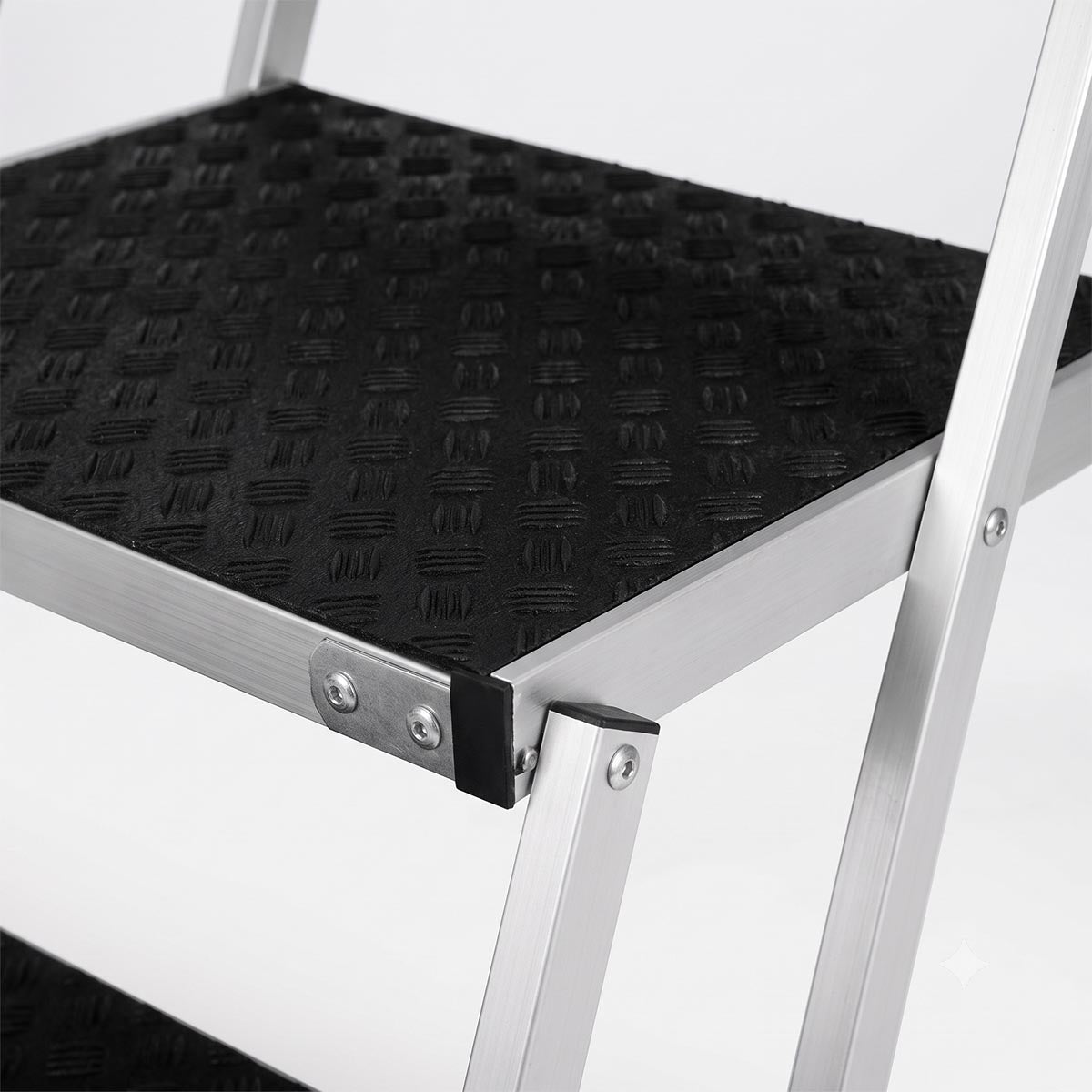 Close-up of non-slip textured surface on dog car stairs