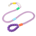 Purple nylon dog leash with foam handle, silicone slider rings, and alloy clasp