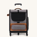 Gray wheeled pet carrier backpack with front mesh window and storage pocket