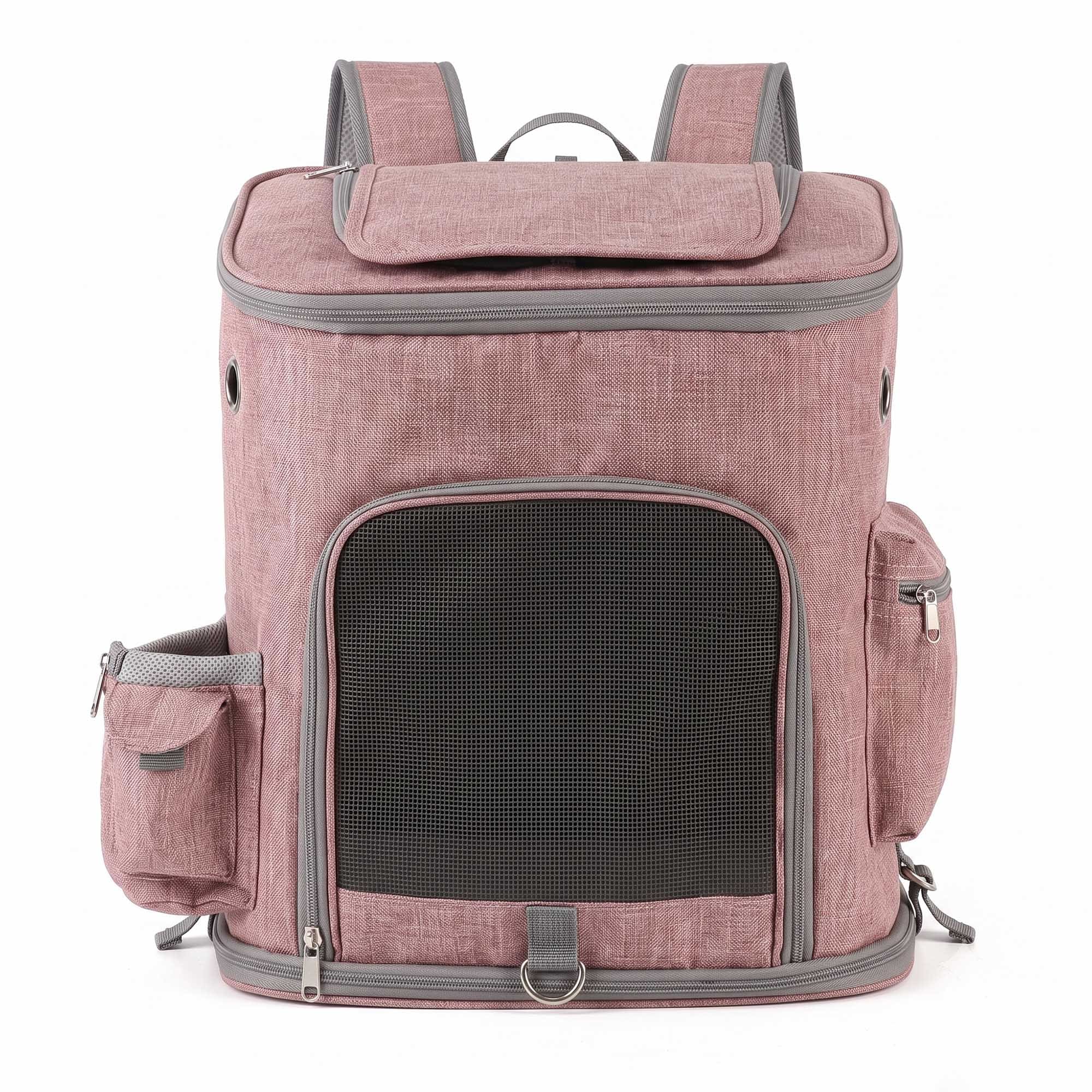 Pink pet carrier backpack with front mesh door, side pockets, and top opening