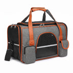Gray breathable pet carrier tote with mesh windows and side storage pockets