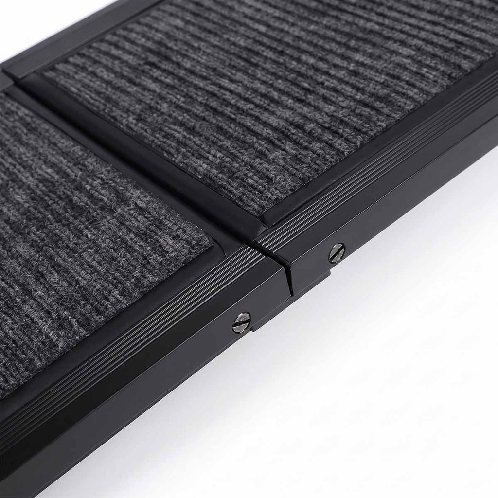 Close-up of reinforced edge and carpet surface on dog car ramp
