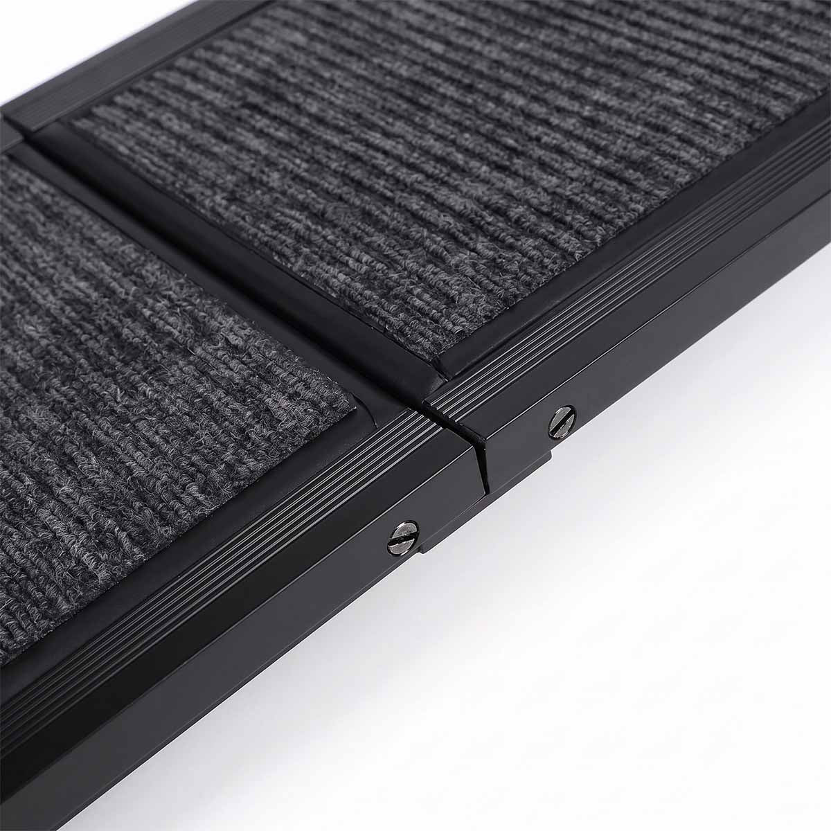Close-up of reinforced edge and carpet surface on dog car ramp
